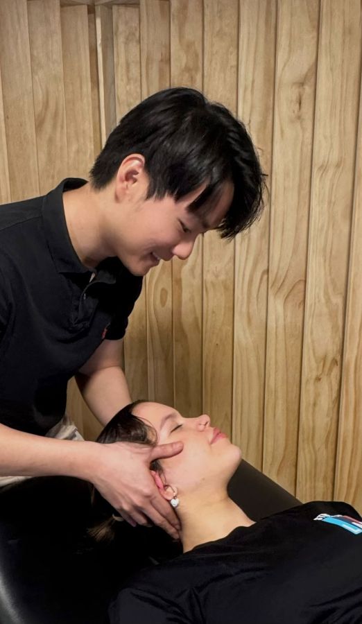 Gentle cervical adjustment performed by Dr Steven Kuan